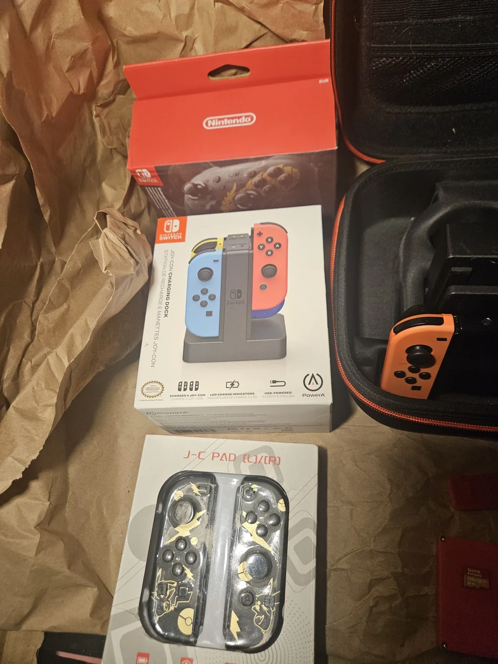 Nintendo Switch Console with Orange Left & Blue Right Joy-Con and Travel Case